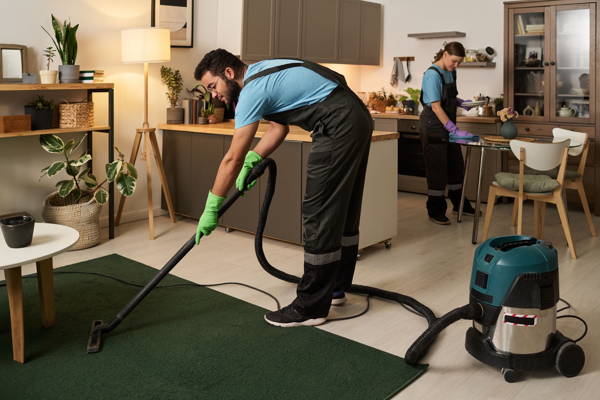 Workers Doing Housework In Apartment